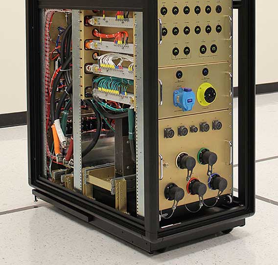A photo of a very large PDU which required a full-sized rack as an enclosure.