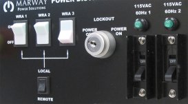 A closeup photo of a PDU control panel with several switches.