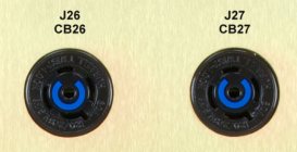 A cropped photo of twist-lock outlets on a PDU.